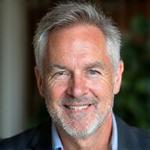 Headshot of Mark, 55, looking relaxed and thoughtful, reflecting his journey to mental clarity.